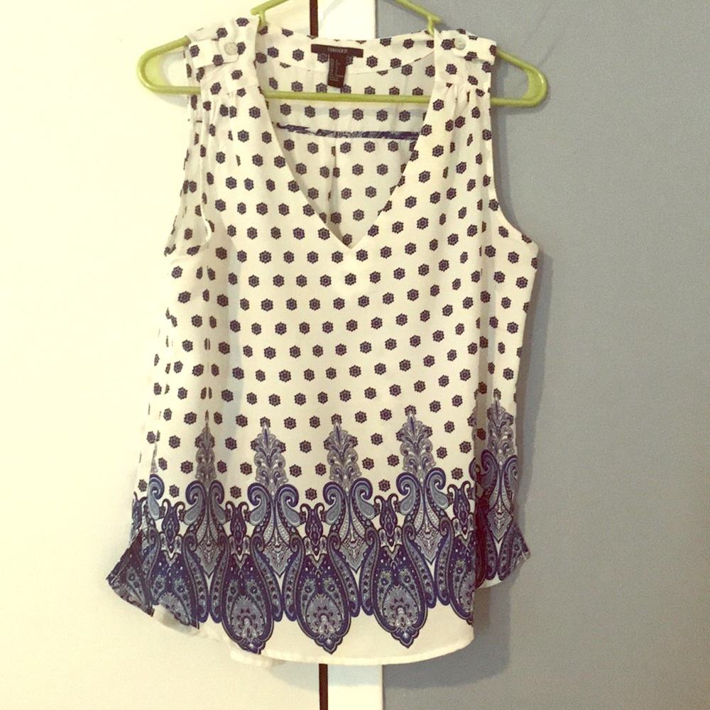 White & blue patterned blouse